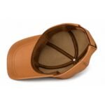 leather baseball cap with curved brim and adjustable back strap.