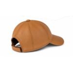 leather baseball cap with curved brim and adjustable back strap.