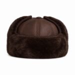 Warm and rugged: Men's shearling sheepskin leather trapper hat with ear flaps, perfect for winter adventures