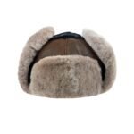 Brown shearling leather trapper hat with soft fur lining, warm winter aviator ushanka style