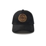Black trucker cap with suede finish, leather Troy Life logo patch, and breathable mesh back