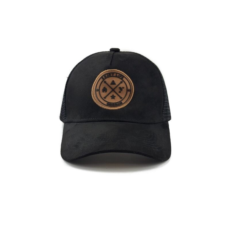 Black trucker cap with suede finish, leather Troy Life logo patch, and breathable mesh back