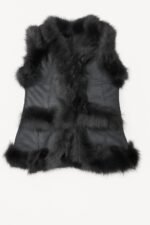Elegant black leather vest with natural fur detailing, perfect for winter layering.