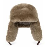 Genuine sheepskin trapper hat with natural fur lining and ear flaps, classic winter aviator style