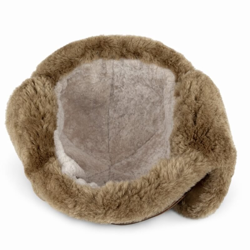 Genuine sheepskin trapper hat with natural fur lining and ear flaps, classic winter aviator style