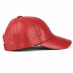 Red leather baseball cap with curved brim and adjustable back strap.