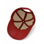 Red leather baseball cap with curved brim and adjustable back strap.